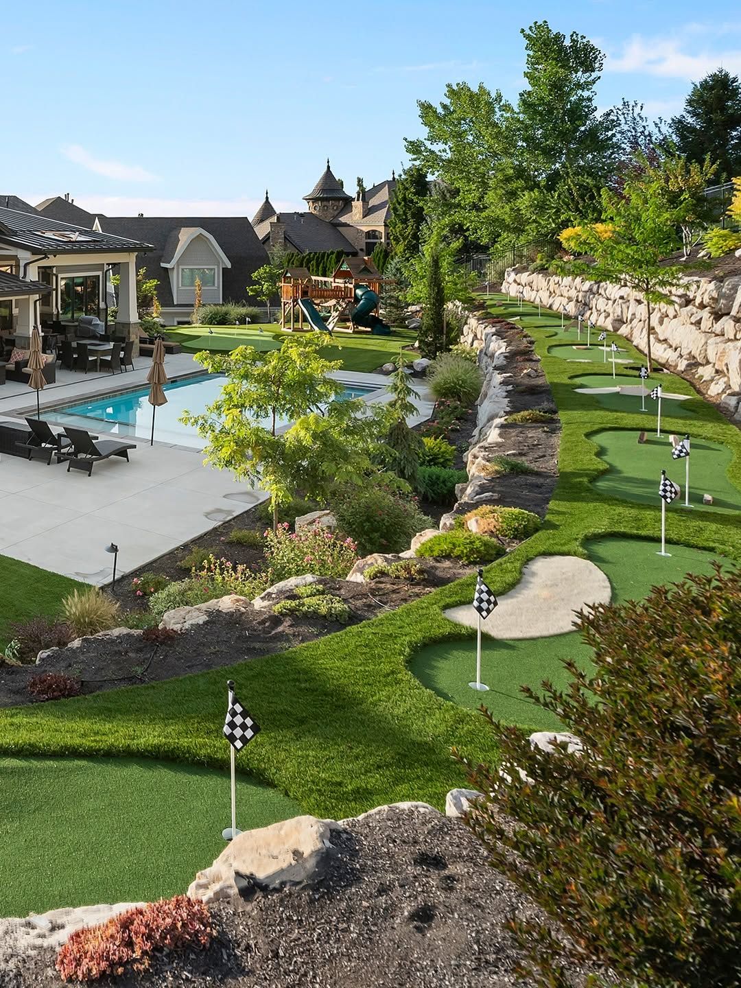 A backyard putting green surfaced in artificial turf